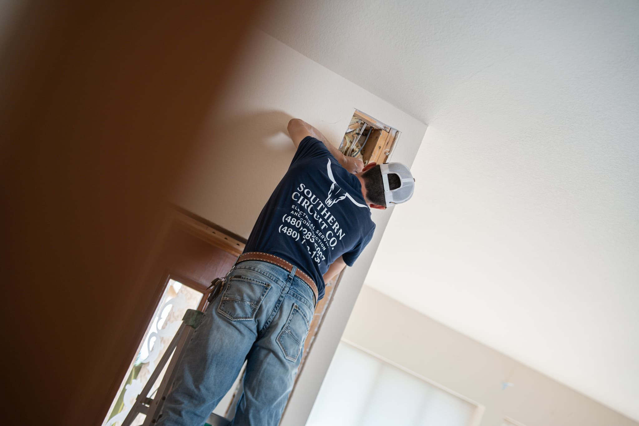 Owners reviewing electrical work on site